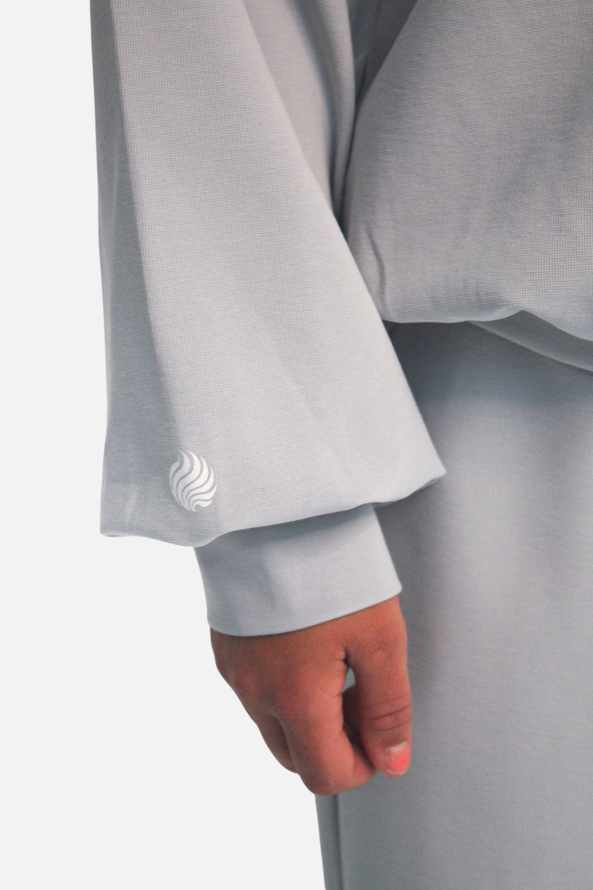 noora light grey cotton-blend 3/4 zip sweater sleeve detail with subtle logo embroidery